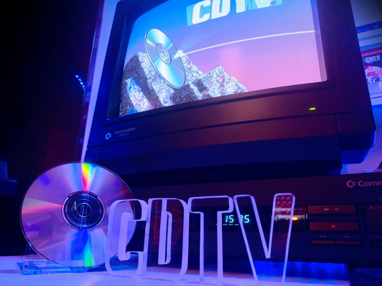 CD1000-with-CDTV-letters-and-compact-disc-D